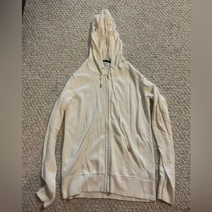 Thick, warm, zip up with golden accents!